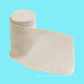 Rouleau de bandage de gaze absorbant en coton jetable